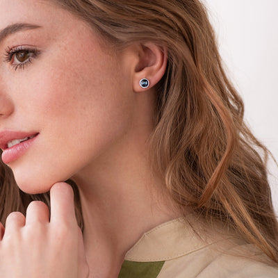 Silver stud earrings with synthetic spinel