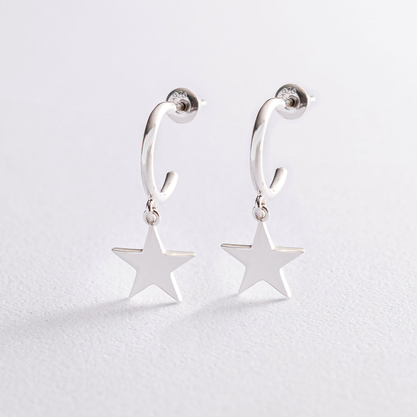 Silver star stud earrings