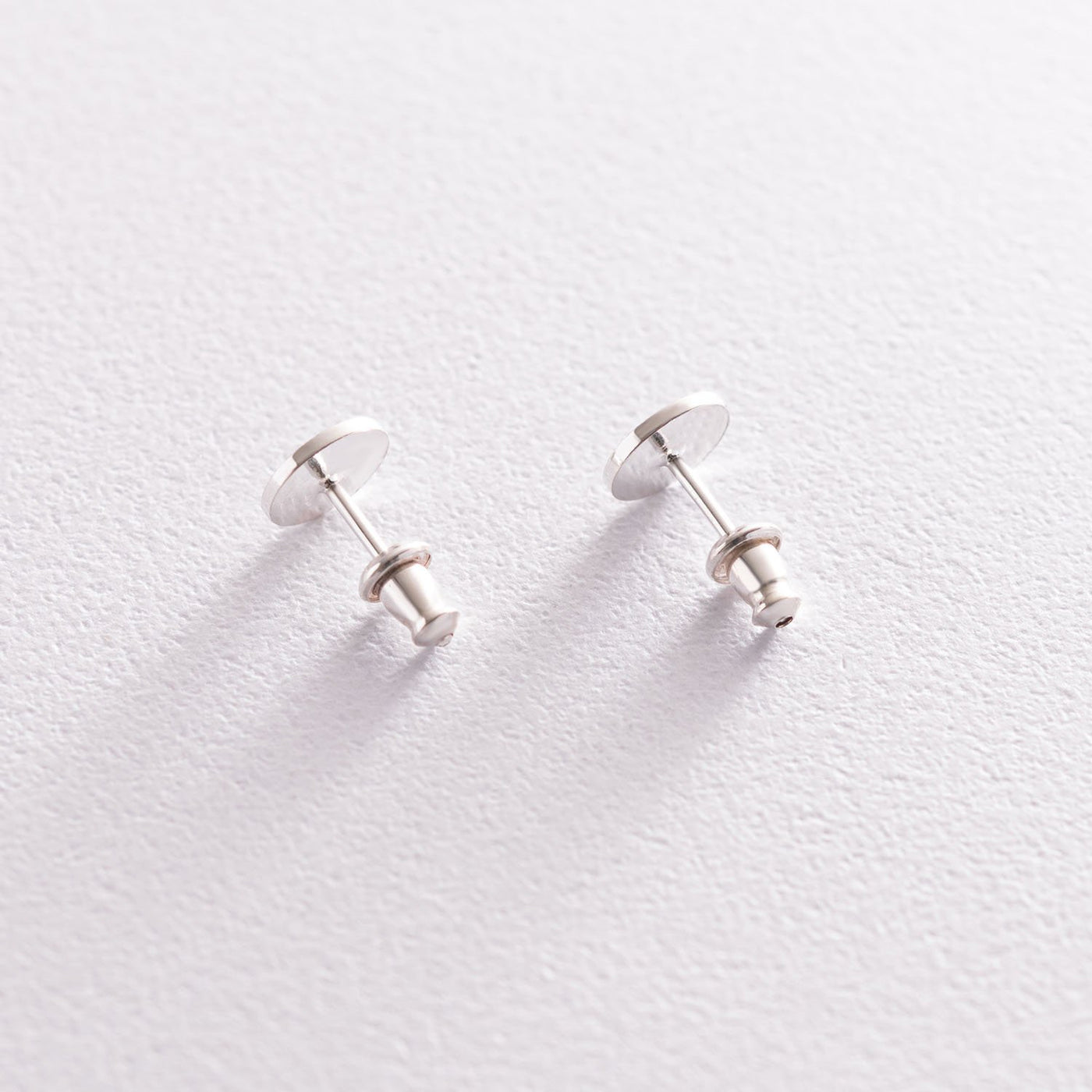 Silver small coins shiny stud earrings