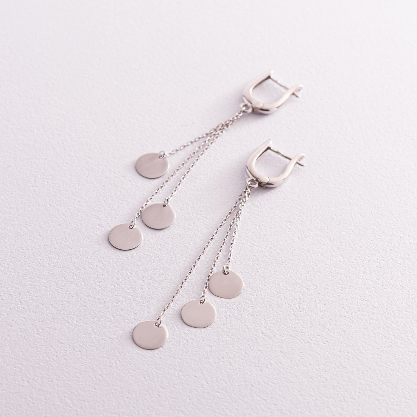 Silver coins chain earrings