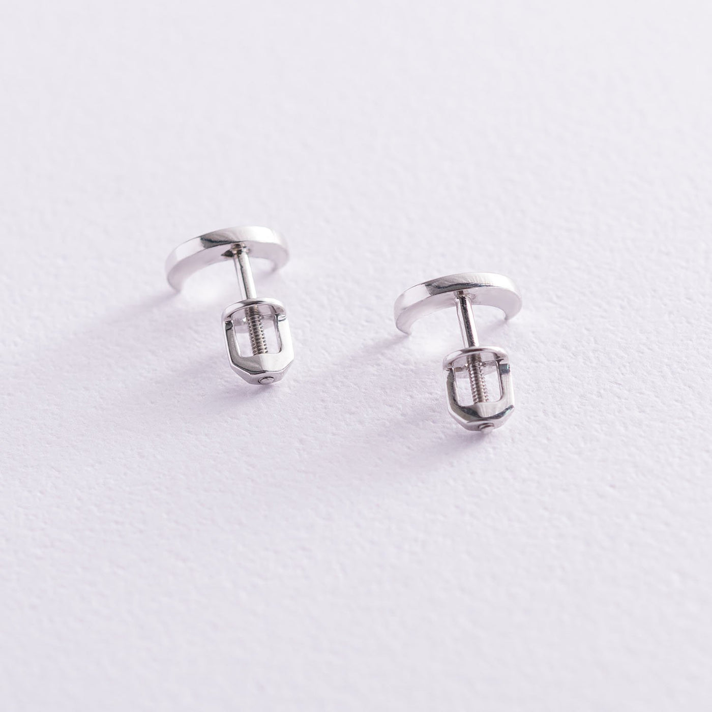 White gold moon stud earrings