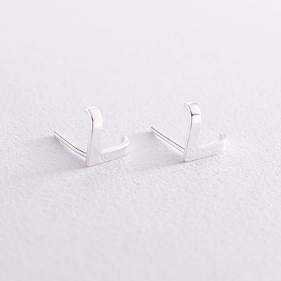 Silver stud earrings Accent