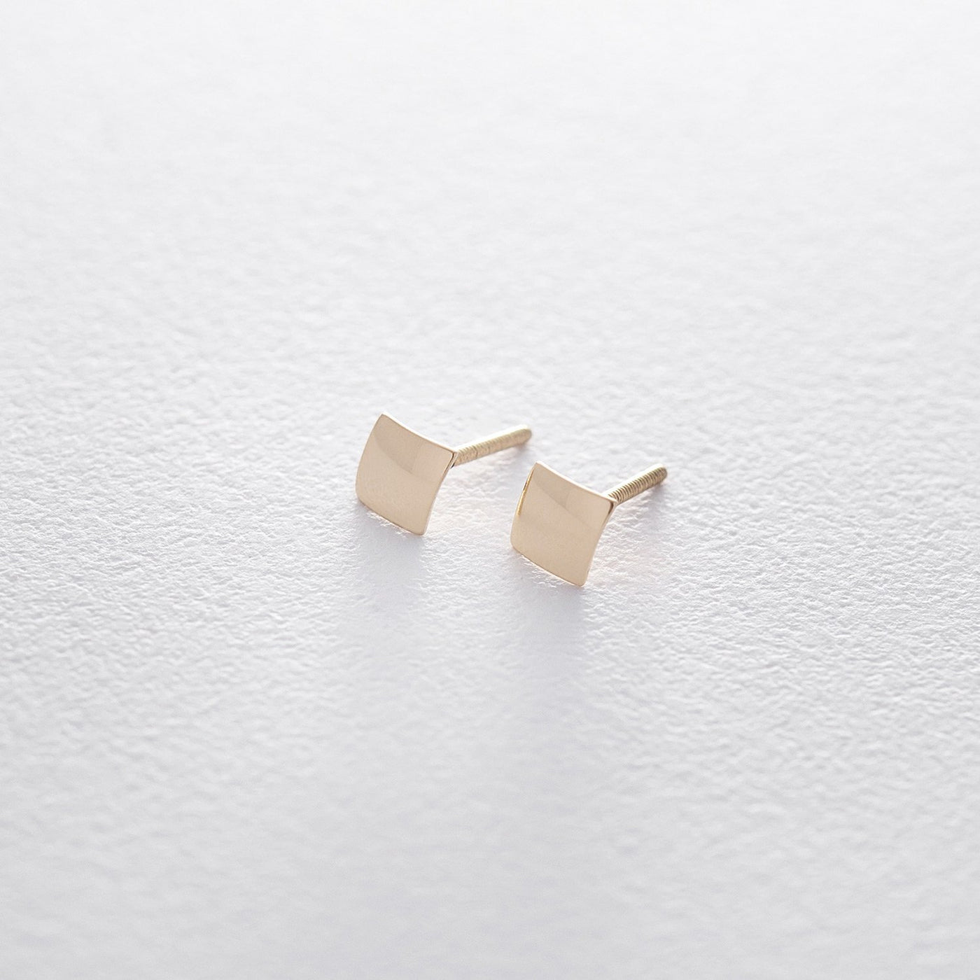 Gold square stud earrings