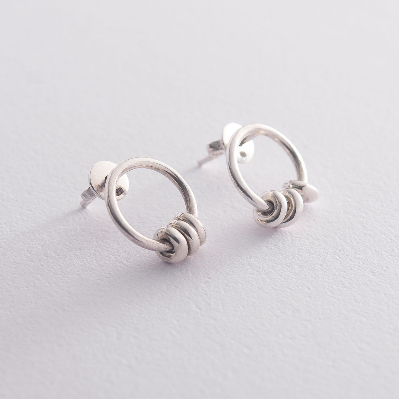 Silver stud earrings Intrigue