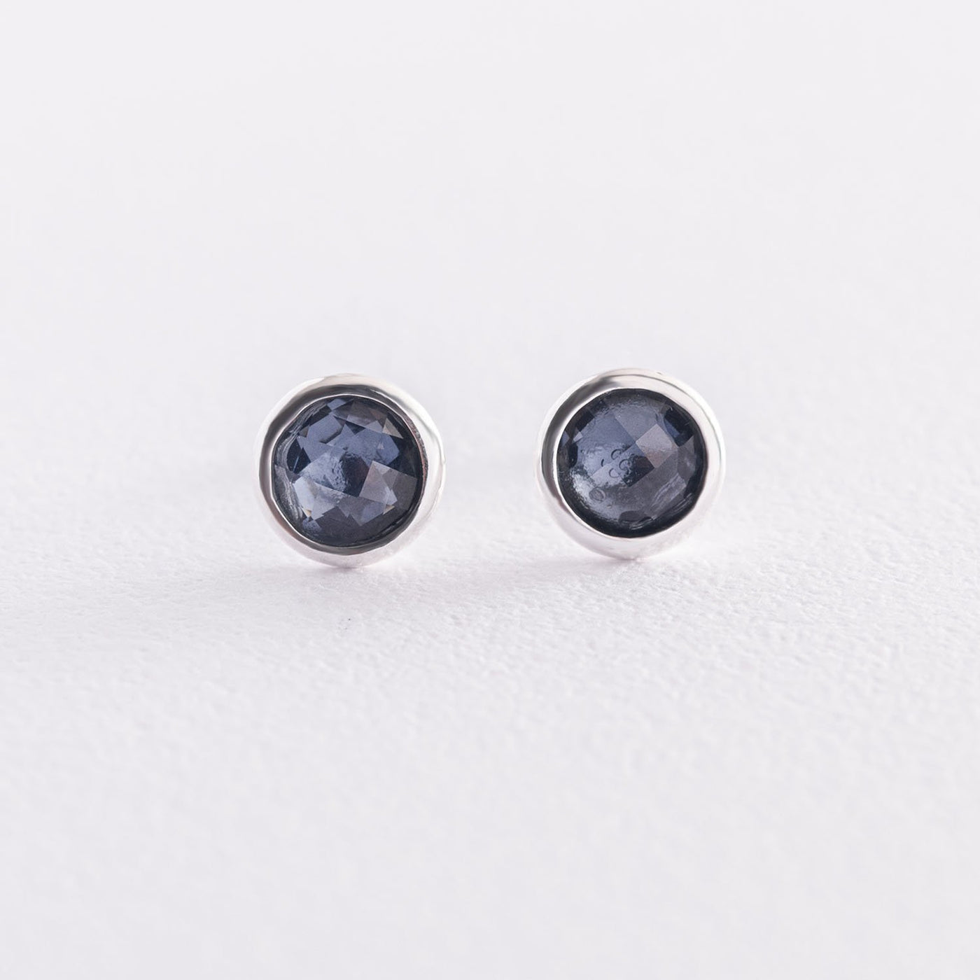 Silver stud earrings with synthetic spinel