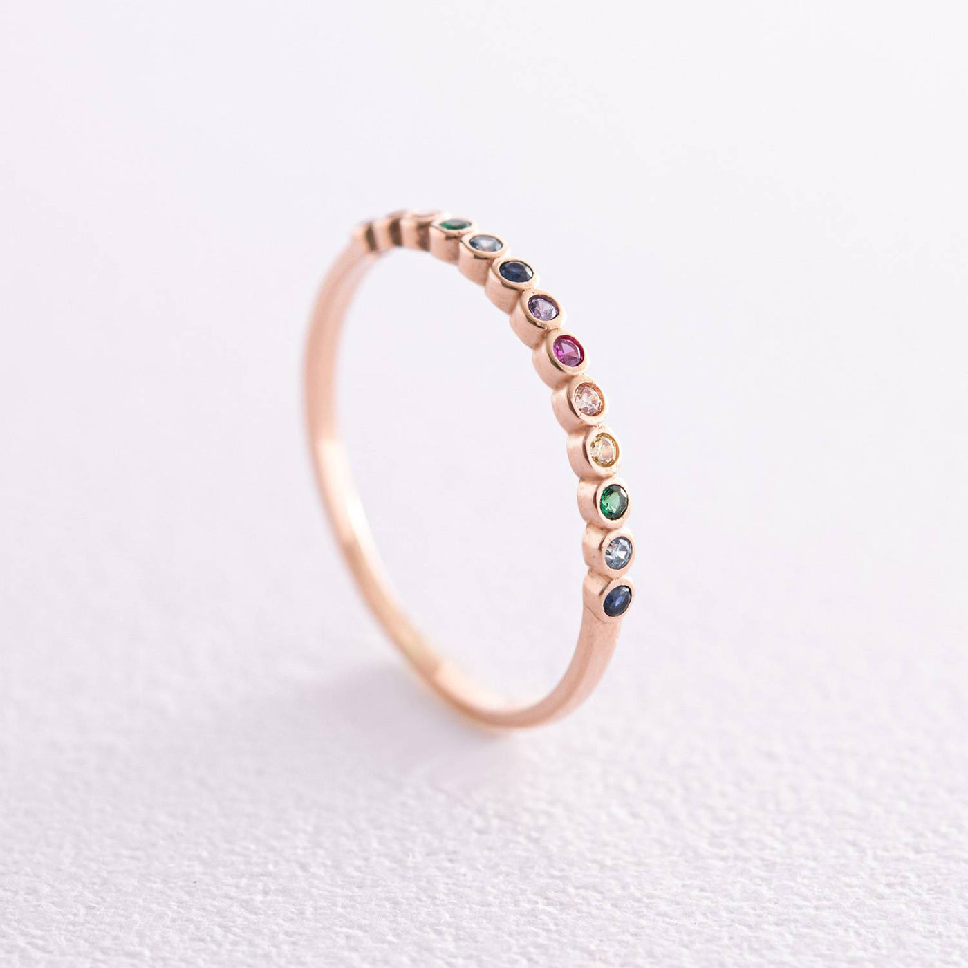 Gold ring with multi-colored cubic zirconia