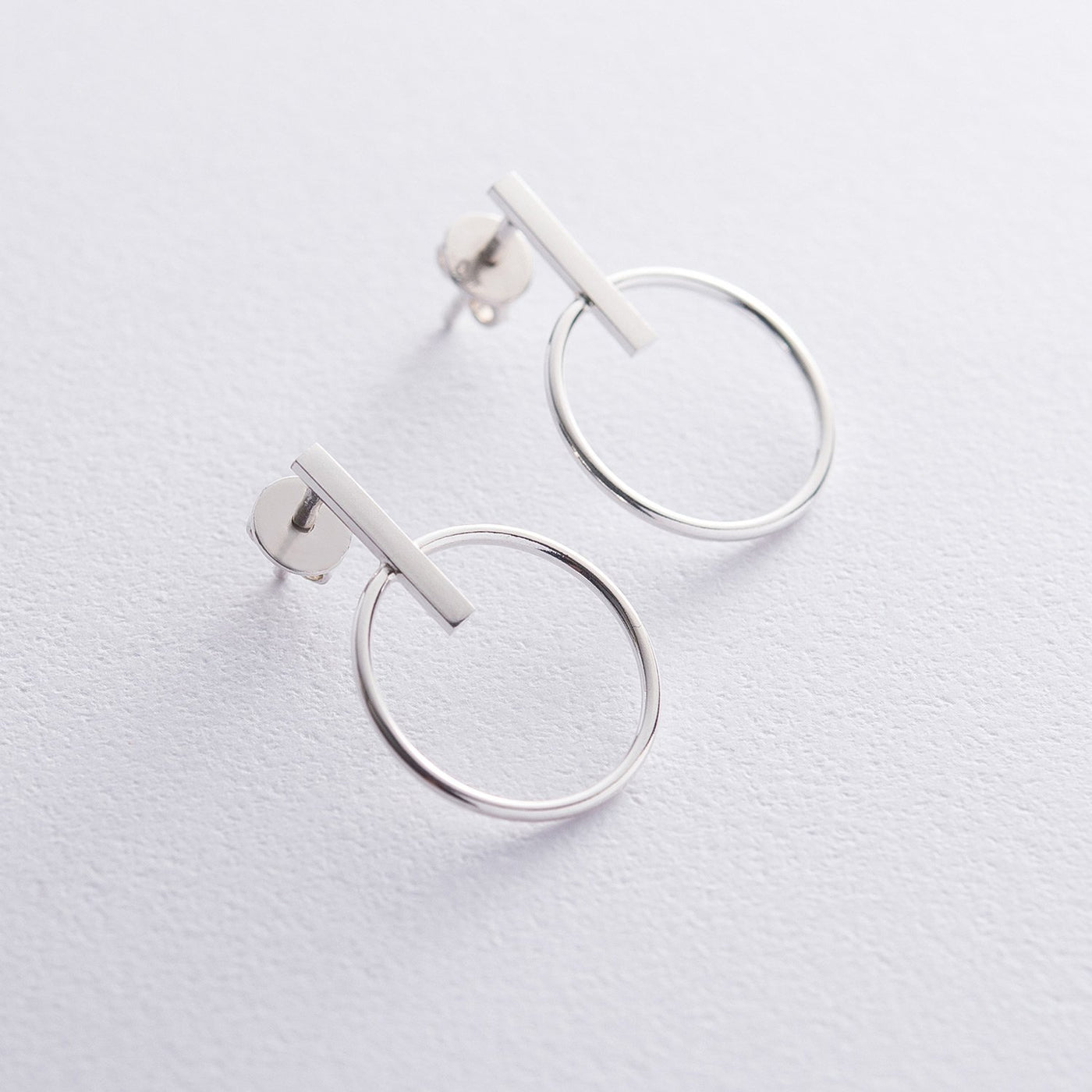 Silver stud earrings Confidence