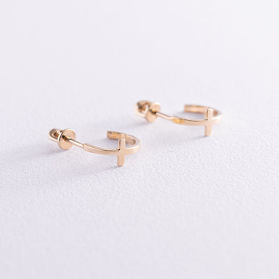 Gold cross stud earrings