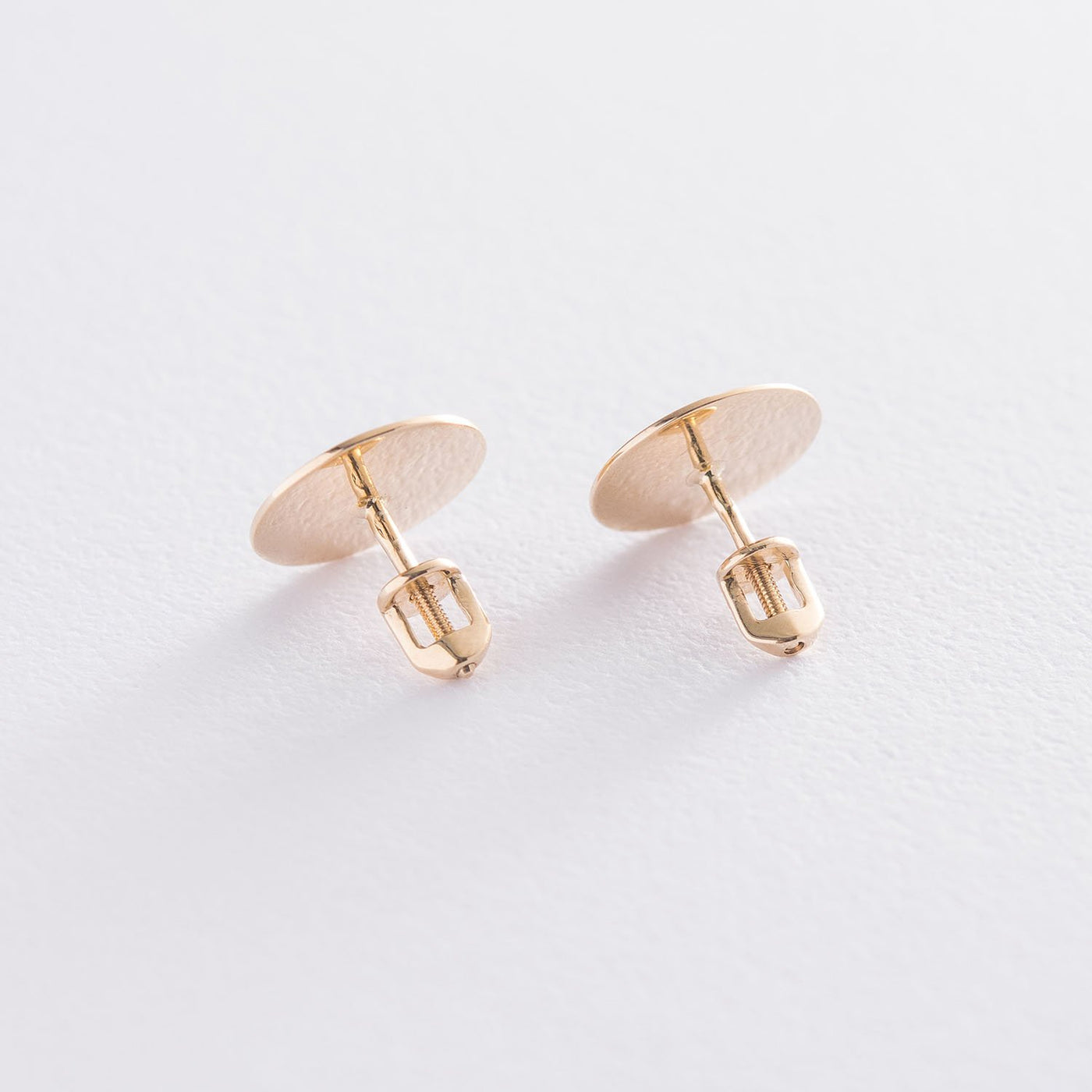 Gold stud earrings Sunbeams