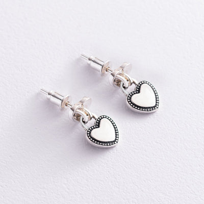 Silver heart and lock stud earrings