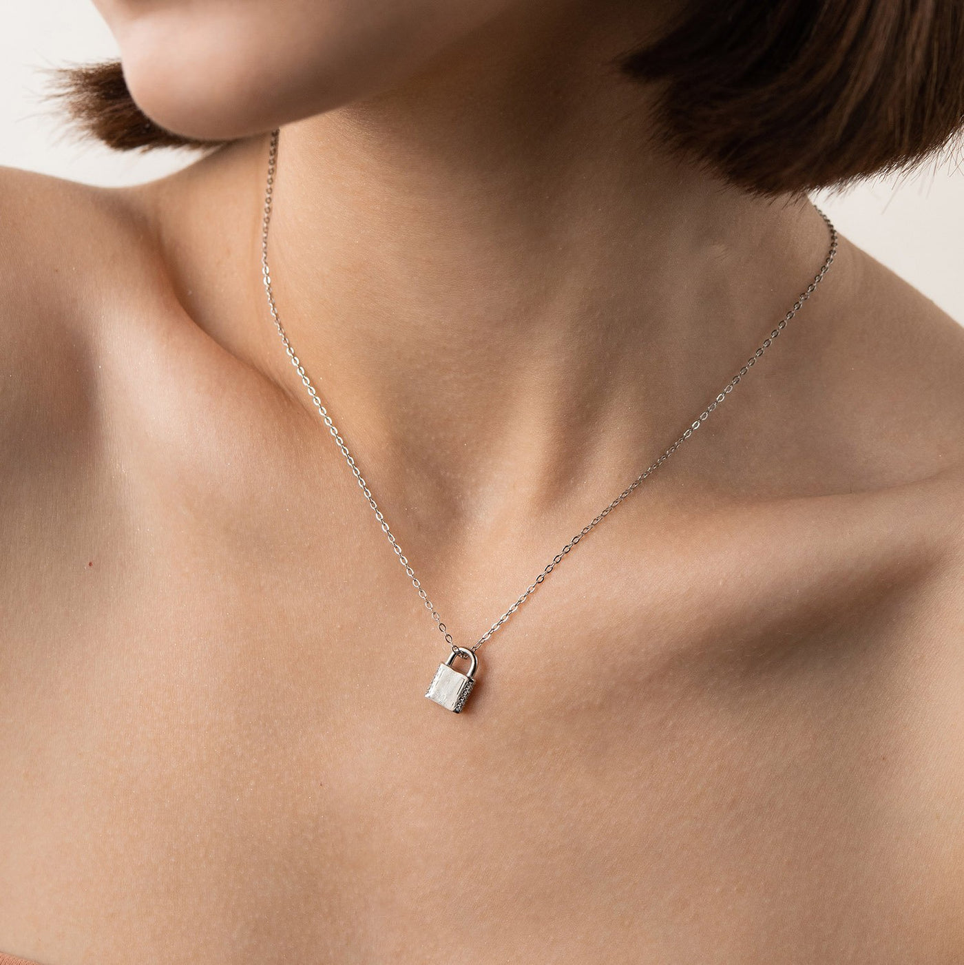 Silver lock necklace with cubic zirconia