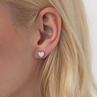 Gold heart stud earrings with opal