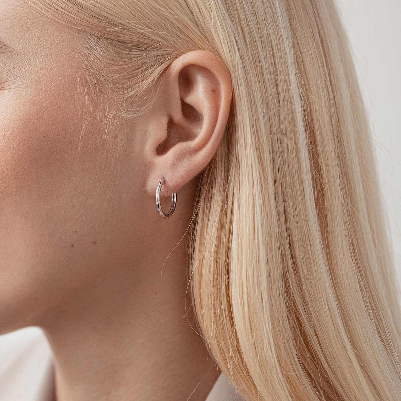 Silver hoop earrings with cubic zirconia