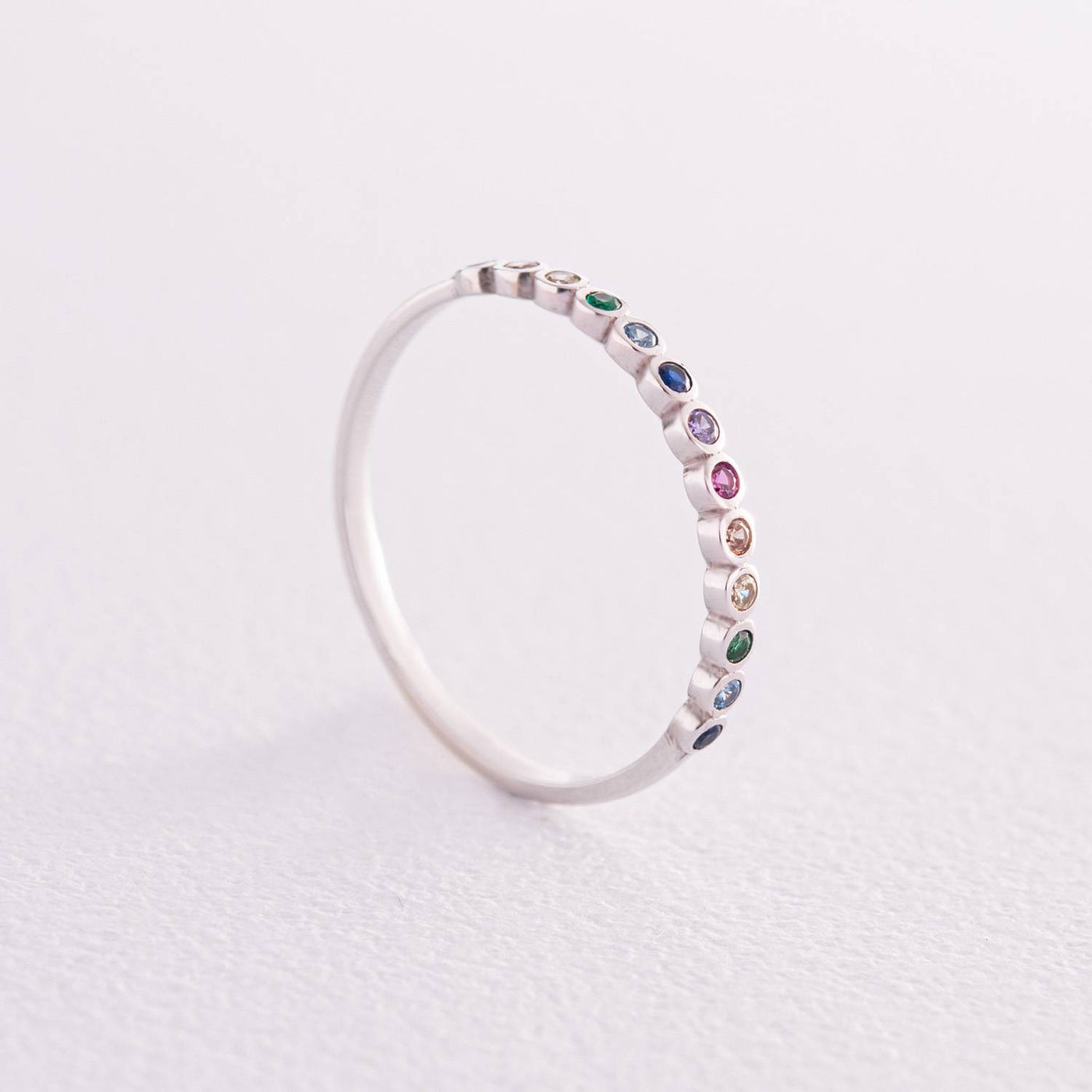 Gold ring with multi-colored cubic zirconia