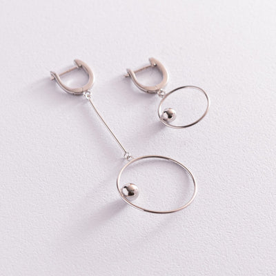 Silver asymmetrical earrings