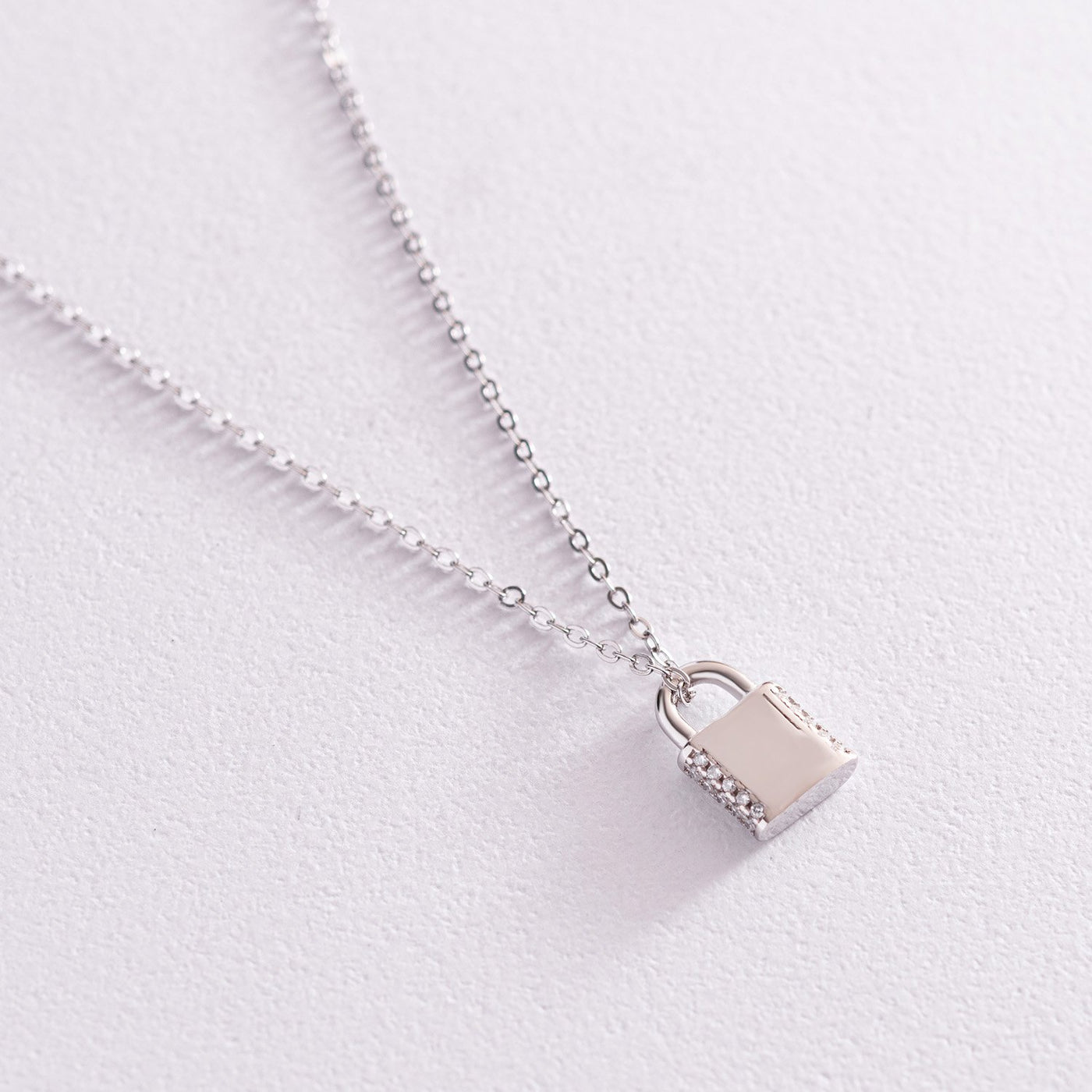 Silver lock necklace with cubic zirconia