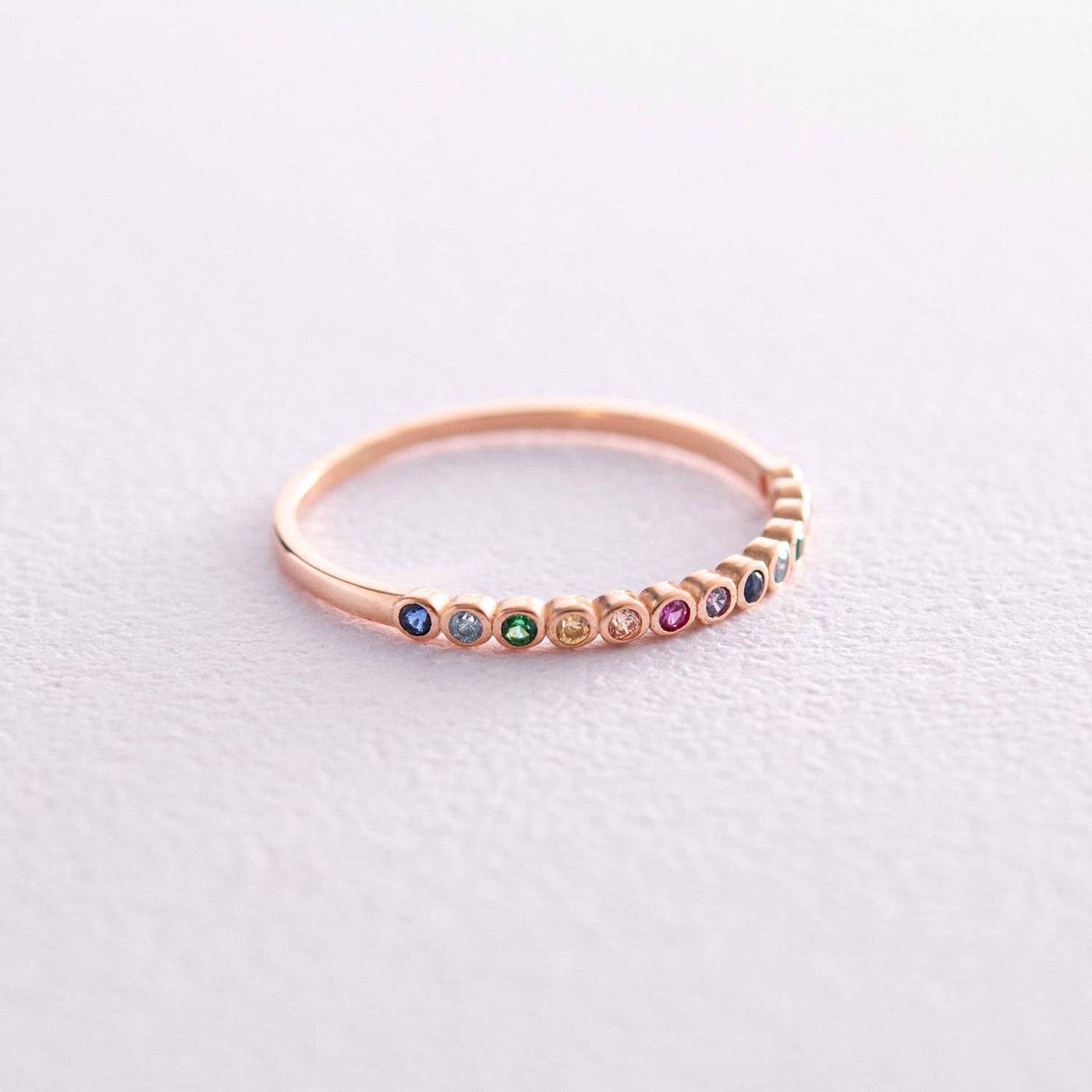 Gold ring with multi-colored cubic zirconia