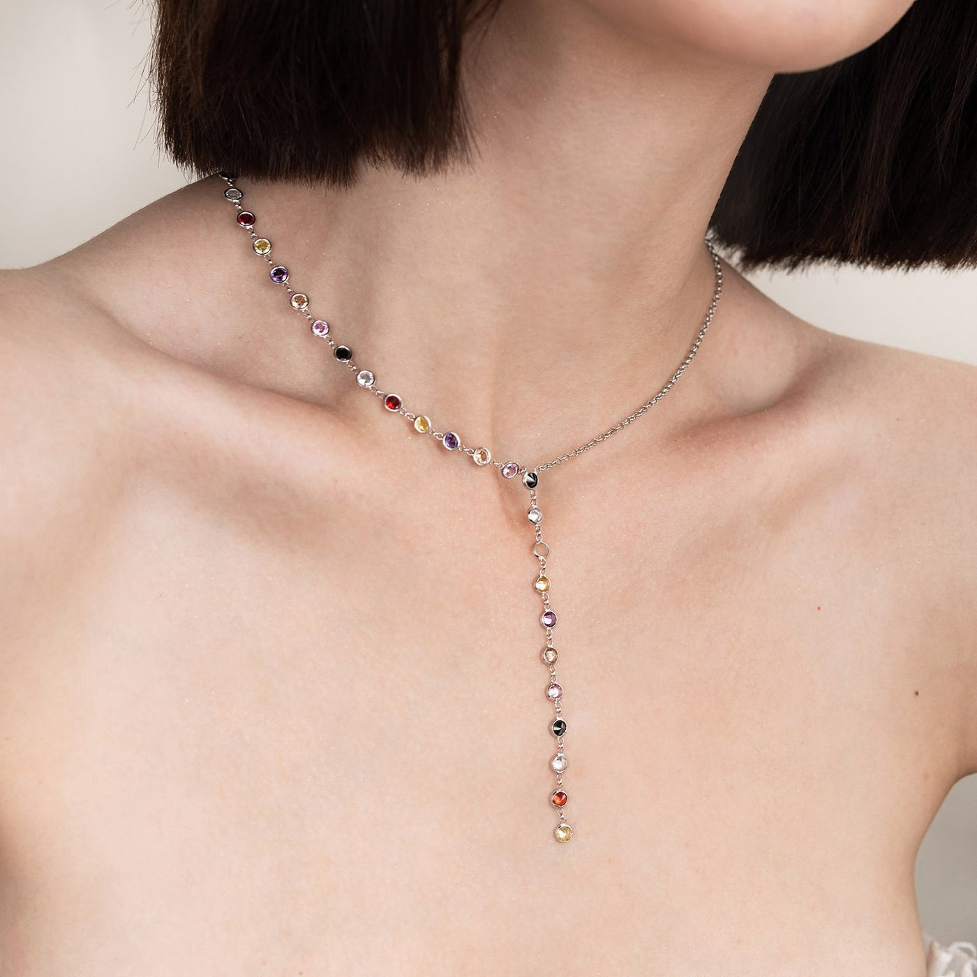 Silver tie necklace with multicolored cubic zirconia