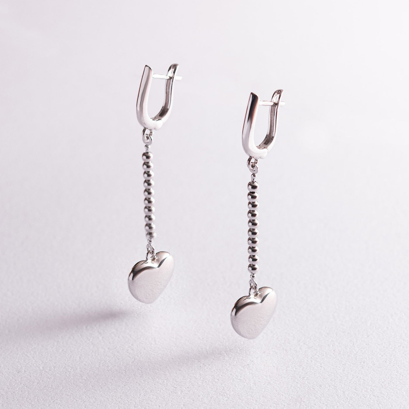 Silver heart chain earrings