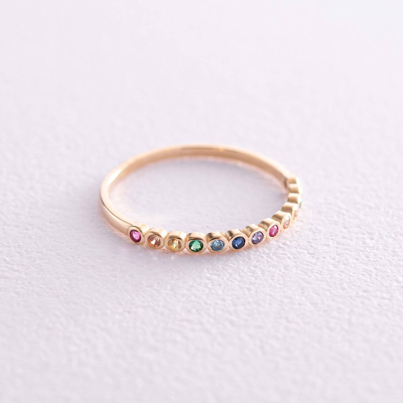 Gold ring with multi-colored cubic zirconia