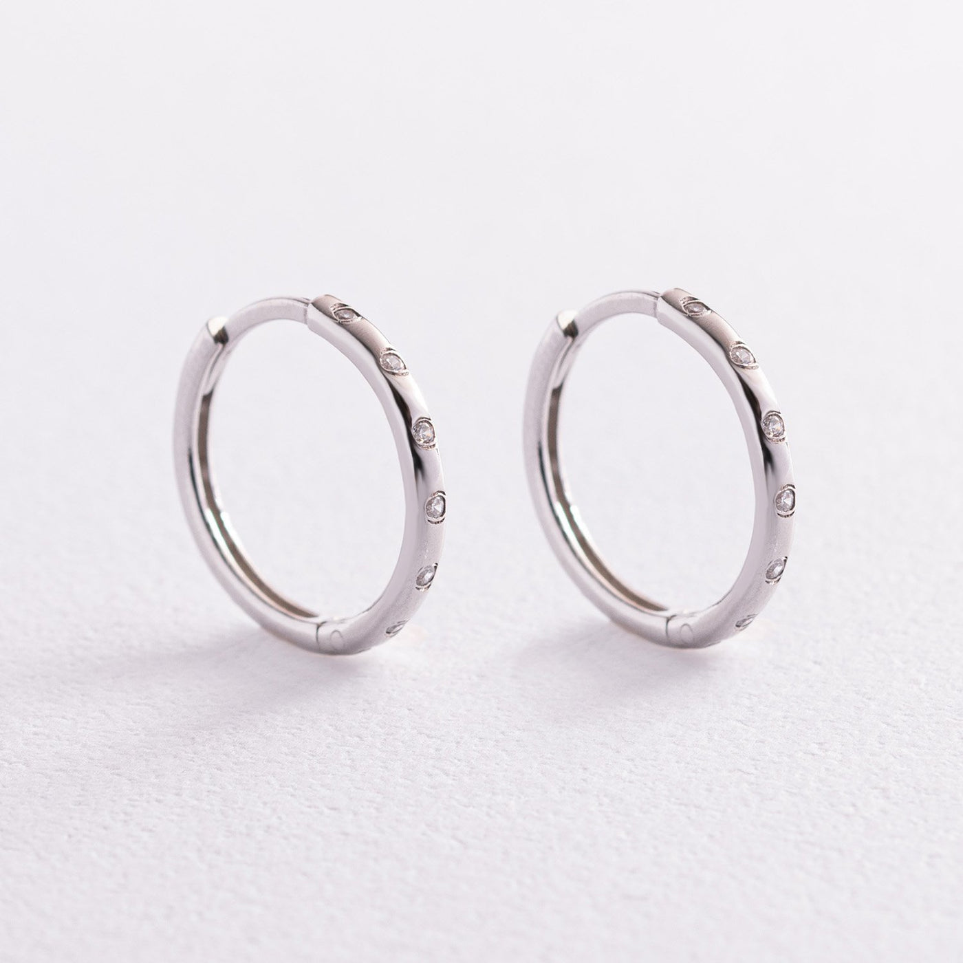 Silver hoop earrings with cubic zirconia