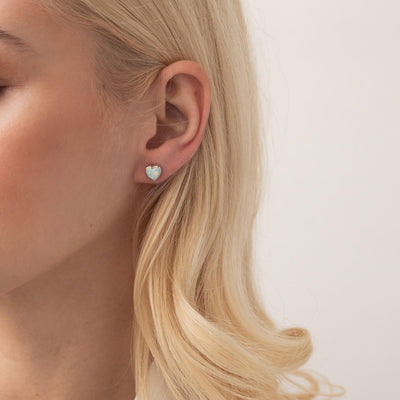 Gold heart stud earrings with opal