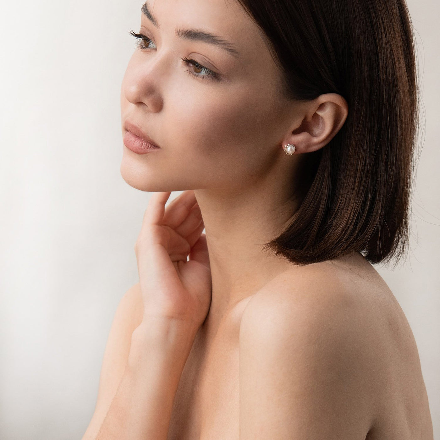 Silver stud earrings with pearls