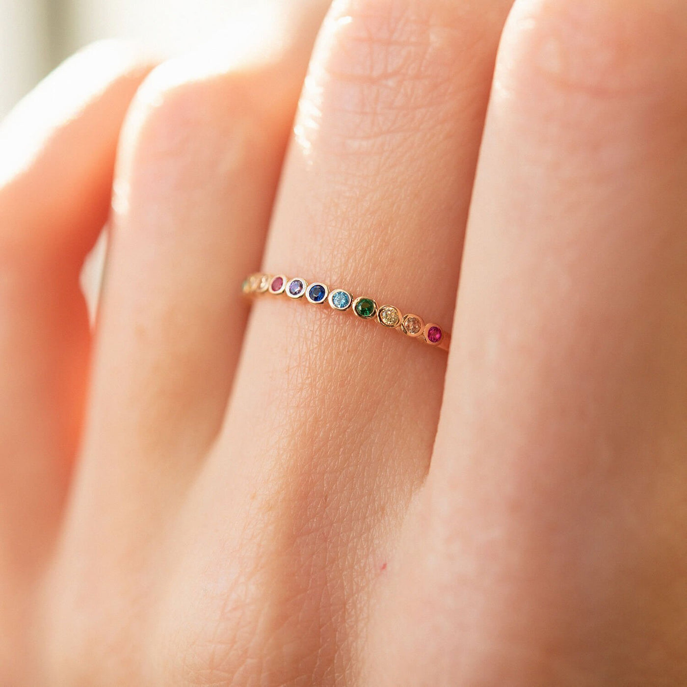 Gold ring with multi-colored cubic zirconia