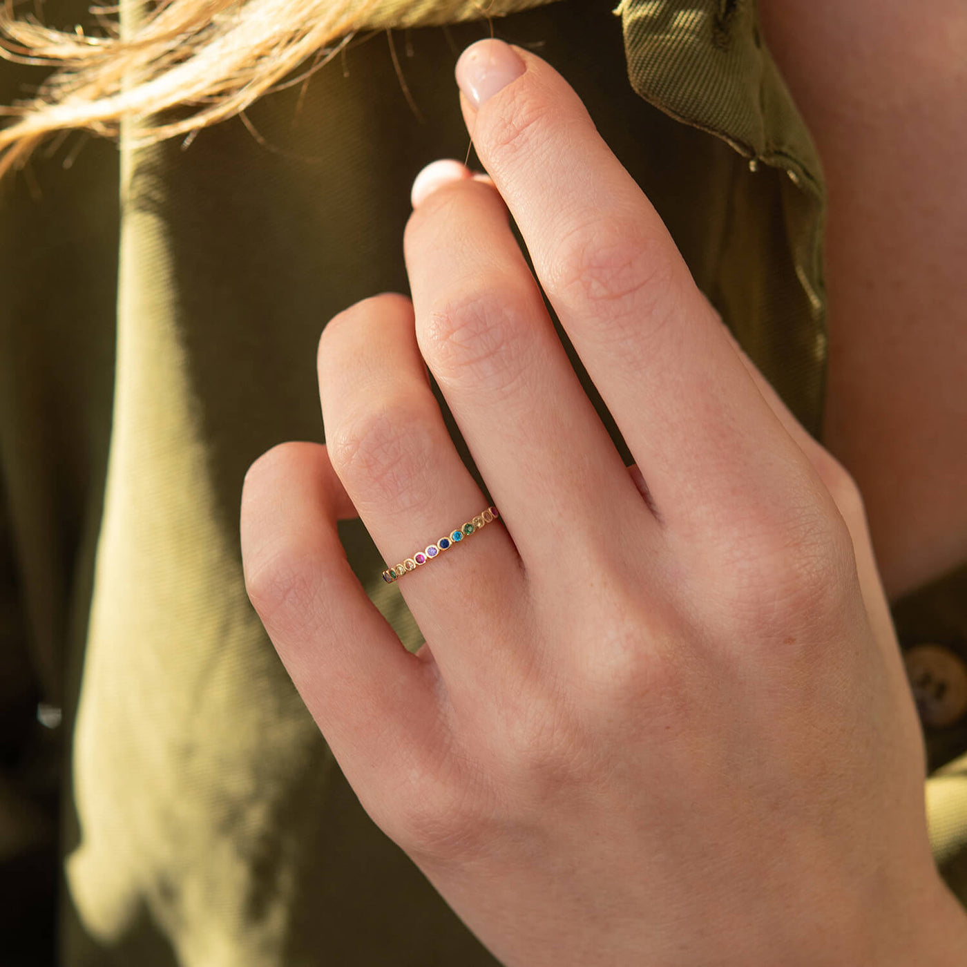 Gold ring with multi-colored cubic zirconia