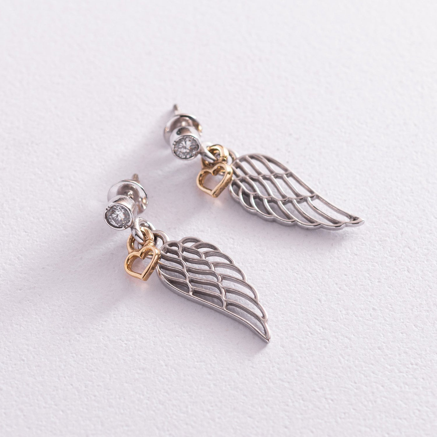 Silver wings stud earrings